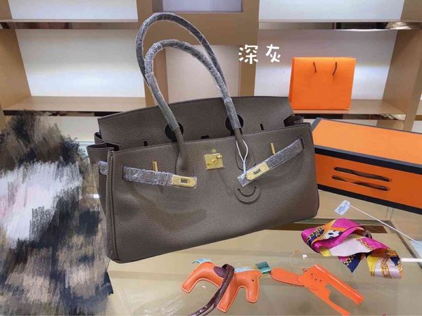 lock horizontal square soft handle solid color inner patch litchi pattern big double root grey pu women's bagzqaw
lock horizontal square soft handle solid color inner patch litchi pattern big double root grey pu women's bagzqaw