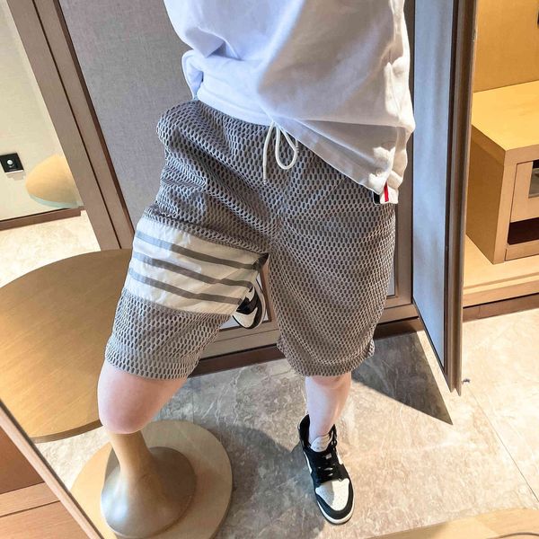 21 summer breathable trendy brand new tb mesh shorts men's and women's casual sports capris four bar loose pants, Black;white
21 summer breathable trendy brand new tb mesh shorts men's and women's casual sports capris four bar loose pants, Black;white