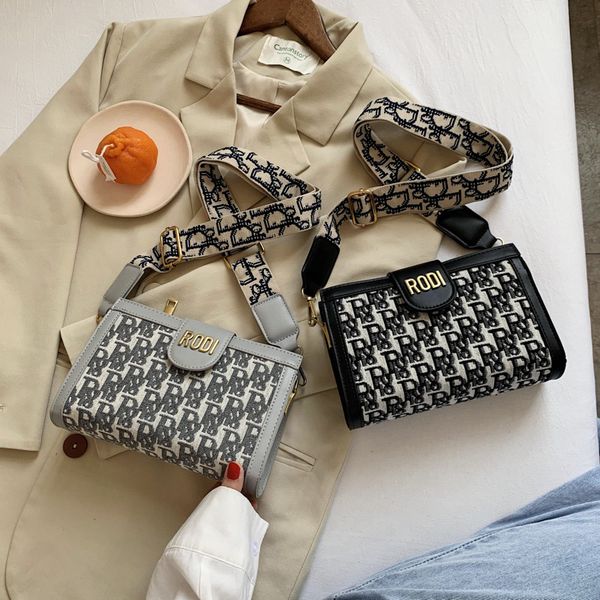 women's bag wide shoulder belt letter embroidery messenger version horizontal cloth small single outlets
women's bag wide shoulder belt letter embroidery messenger version horizontal cloth small single outlets