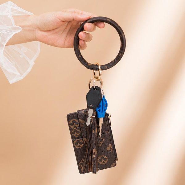 card holders fashion bracelet tassel set combination key bag small ornaments keychain coin purse anti-theft handle jewelry, Brown;gray
card holders fashion bracelet tassel set combination key bag small ornaments keychain coin purse anti-theft handle jewelry, Brown;gray