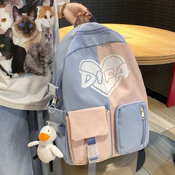 backpack hearts printed to be waterproof female rucksack made double-colour contrast teen travel bag
backpack hearts printed to be waterproof female rucksack made double-colour contrast teen travel bag