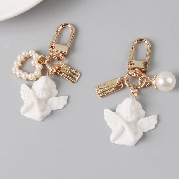 keychains vintage white angel pendant keychain for women girl cute pearl bead heart key chain gold color car ring holder charm jewelry, Silver
keychains vintage white angel pendant keychain for women girl cute pearl bead heart key chain gold color car ring holder charm jewelry, Silver