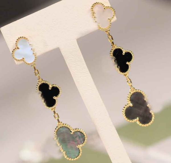 s925 silver drop earring three flowers shape drop earring with white shell grey shell and black agate in 18k gold plated web 1