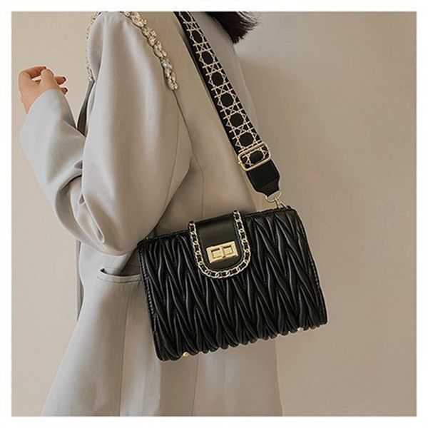 factory direct sale 75% off underarm female 2021 new winter korean embroidered line pleated single shoulder wide shoulder belt diagonal bags 
factory direct sale 75% off underarm female 2021 new winter korean embroidered line pleated single shoulder wide shoulder belt diagonal bags