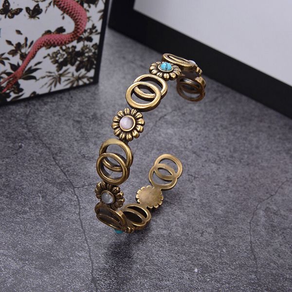 2022 brand original jewelry designer bangle ladies fashion simple high-end real gold electroplating daisy hollow letter open bracelet, Black
2022 brand original jewelry designer bangle ladies fashion simple high-end real gold electroplating daisy hollow letter open bracelet, Black