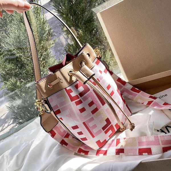 net red new printed canvas rainbow bucket bag female flower drawstring single shoulder diagonal cross wide strap handbag outlet purse
net red new printed canvas rainbow bucket bag female flower drawstring single shoulder diagonal cross wide strap handbag outlet purse