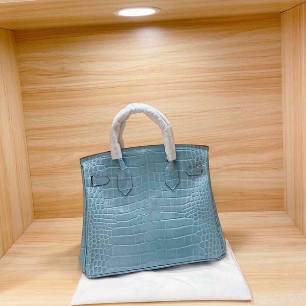 design s bag horizontal type square blue hard handle medium solid color pull strap buckle cover leather bag
design s bag horizontal type square blue hard handle medium solid color pull strap buckle cover leather bag
