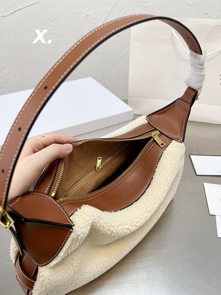 2021 new women's shoulder bag designer messenger bag handbag party lamb hair fur shopping bag wallet size: 36*17cm
2021 new women's shoulder bag designer messenger bag handbag party lamb hair fur shopping bag wallet size: 36*17cm