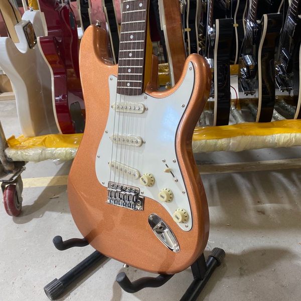 st electric guitar metallic orange body rosewood fingerboard chrome hardware guitarar
st electric guitar metallic orange body rosewood fingerboard chrome hardware guitarar