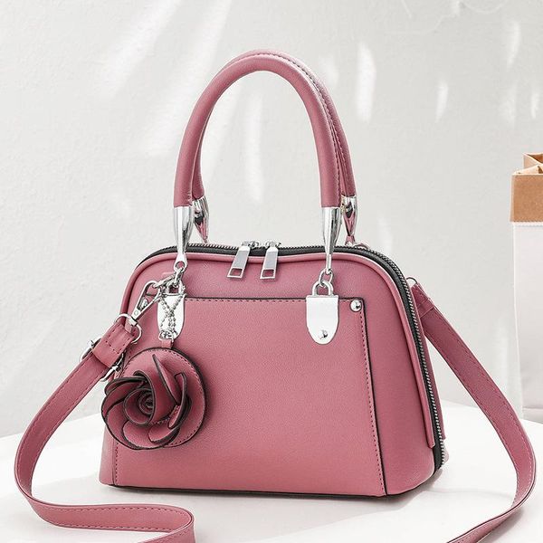 2021 new style handbag fashion elegant flower pendant women's shoulder handbag simple and versatile shell bag women
2021 new style handbag fashion elegant flower pendant women's shoulder handbag simple and versatile shell bag women