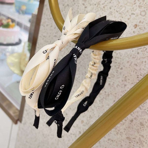small fragrant ribbon letter hoop surrounded headband girl headdress simple luxury black white, Black;brown
small fragrant ribbon letter hoop surrounded headband girl headdress simple luxury black white, Black;brown