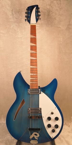 12 string electric guitar, ricken 360 electric guitar,blue burst body with rosewood fingerboard,ing
12 string electric guitar, ricken 360 electric guitar,blue burst body with rosewood fingerboard,ing