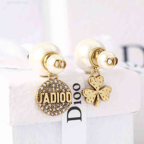 dio/christian d lucky grass female di family letter diamond inlaid pearl net red earrings, Red;brown
dio/christian d lucky grass female di family letter diamond inlaid pearl net red earrings, Red;brown