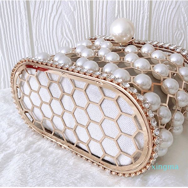designer pearl women's handbag hollow out wedding clutch purse bag female rhinestone metal cage basket shoulder bag
designer pearl women's handbag hollow out wedding clutch purse bag female rhinestone metal cage basket shoulder bag