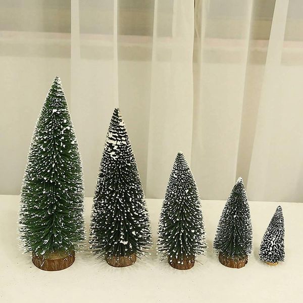 christmas decorations are dyed with white cedar mini trees decorated needles on the table year 2022
christmas decorations are dyed with white cedar mini trees decorated needles on the table year 2022