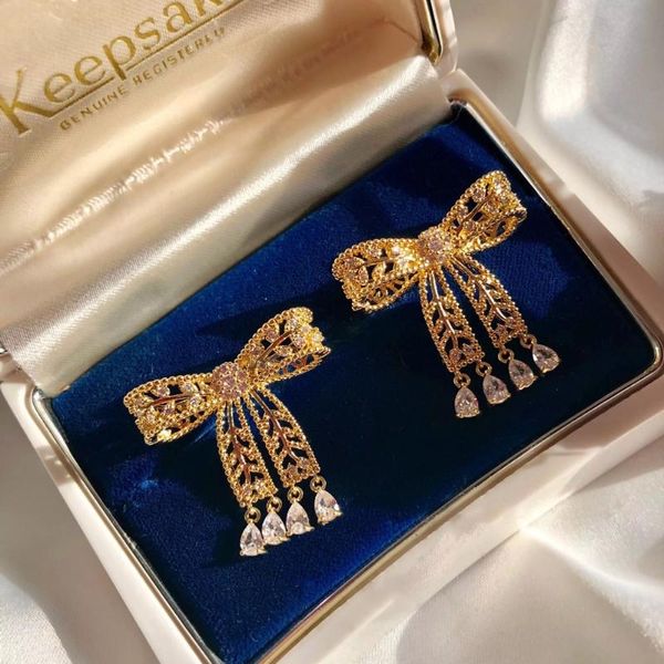 japanese and korean style sweet girlish lace hollow out bowknot water drop tassel silver gold earrings
japanese and korean style sweet girlish lace hollow out bowknot water drop tassel silver gold earrings