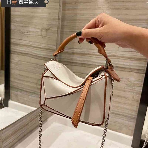 lo yi mini geometric handbag bag head leather white brown one shoulder handbag size 17 parcel mail manufacturer directada0
lo yi mini geometric handbag bag head leather white brown one shoulder handbag size 17 parcel mail manufacturer directada0