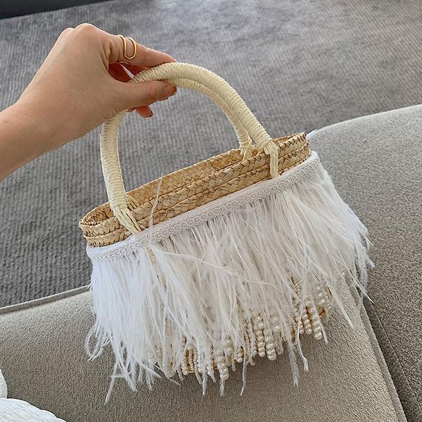 evening bags handmade straw women weaving rattan totes ladies feather pearl tassel beach handbags with sun hat 2021 summer
evening bags handmade straw women weaving rattan totes ladies feather pearl tassel beach handbags with sun hat 2021 summer