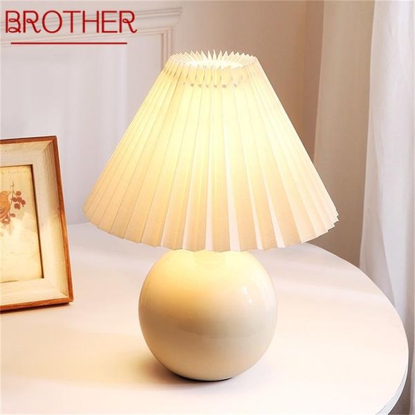 table lamps brother creative ceramic led simple white desk light for home decoration
table lamps brother creative ceramic led simple white desk light for home decoration