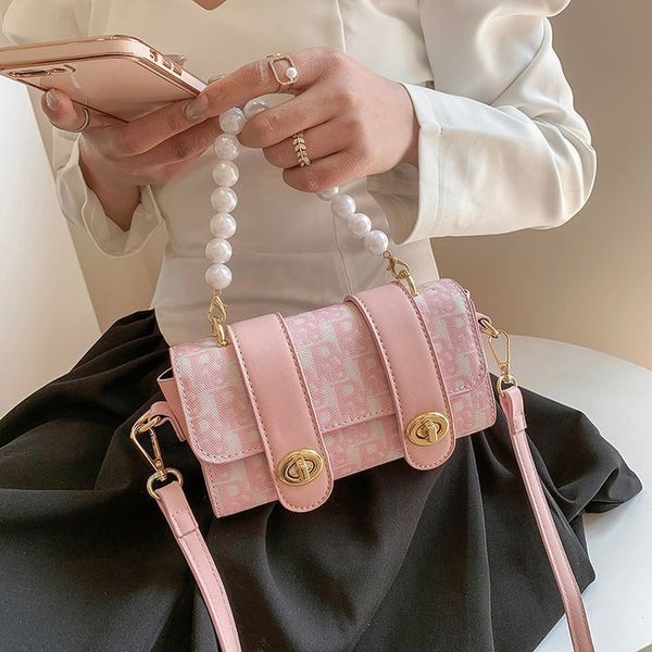 2021 texture bag women's new fashion net red magnetic buckle messenger fashion boston bag
2021 texture bag women's new fashion net red magnetic buckle messenger fashion boston bag