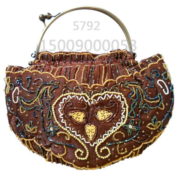 pearl embroidered bag women's double-sided flower national style copper handle shoulder messenger dinner
pearl embroidered bag women's double-sided flower national style copper handle shoulder messenger dinner