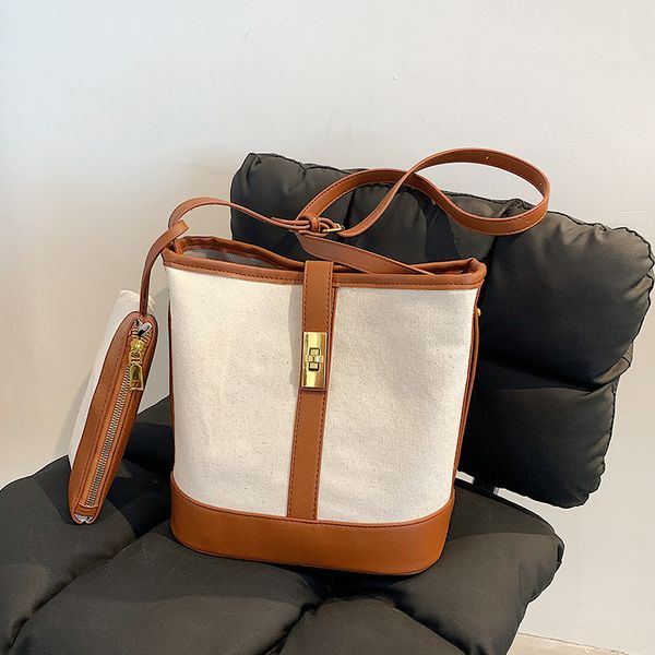 luxury handbags canvas bucket new simple one shoulder large capacity commuting advanced french color matching women's bag
luxury handbags canvas bucket new simple one shoulder large capacity commuting advanced french color matching women's bag