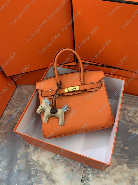 Wholesale 35CM 30CM 25CM Women Totes Genuine Leather Shoulder bags With Stamped Lock Lady Fashion Handbag Scarf Horse Charm All colour
Wholesale 35CM 30CM 25CM Women Totes Genuine Leather Shoulder bags With Stamped Lock Lady Fashion Handbag Scarf Horse Charm All colour