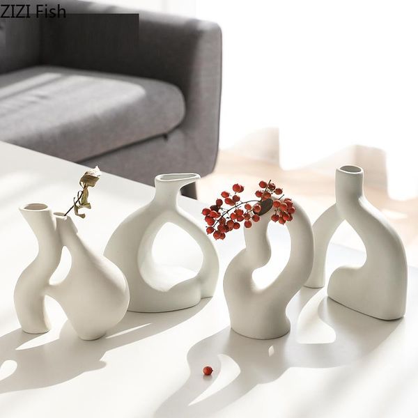 vases creative white irregular ceramic vase living room decoration dried flower arrangement counterabstract art crafts
vases creative white irregular ceramic vase living room decoration dried flower arrangement counterabstract art crafts
