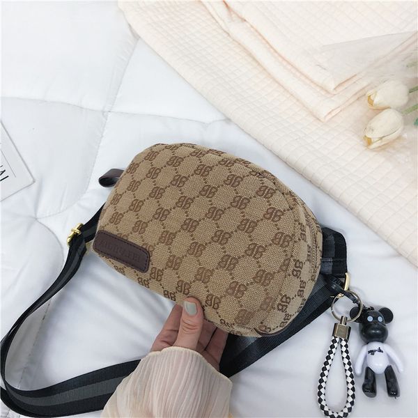 net red small bag women's chest summer new fashion canvas shell leisure wide shoulder belt messenger
net red small bag women's chest summer new fashion canvas shell leisure wide shoulder belt messenger