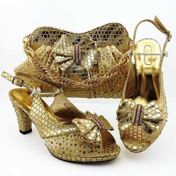 beautiful gold women pumps match handbag with rhinestone bowtie style african dress shoes and bag set mm1094,heel 9cm, Black
beautiful gold women pumps match handbag with rhinestone bowtie style african dress shoes and bag set mm1094,heel 9cm, Black