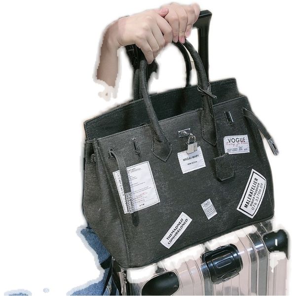 spoof brand denim canvas one shoulder messenger bag women's 2020 new fashion large capacity badge handbag
spoof brand denim canvas one shoulder messenger bag women's 2020 new fashion large capacity badge handbag