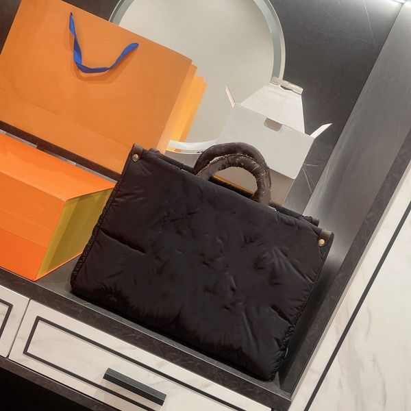designer autumn and winter luxury shopping bags large capacity down jacket material tote bag
designer autumn and winter luxury shopping bags large capacity down jacket material tote bag