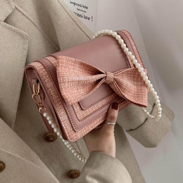 cross body bow square crossbody bag 2021 fashion high-quality pu leather women's designer handbag pearl strap shoulder messenger
cross body bow square crossbody bag 2021 fashion high-quality pu leather women's designer handbag pearl strap shoulder messenger