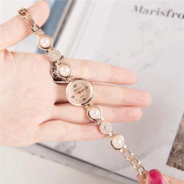 women wristwatches vintage diamond pearl style bracelet chain girl watches luxury fashion stainless steel small crystal quartz watch, Slivery;brown
women wristwatches vintage diamond pearl style bracelet chain girl watches luxury fashion stainless steel small crystal quartz watch, Slivery;brown