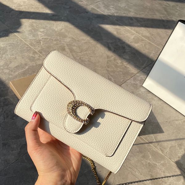 2021 new woc chain small square bag tabby mini diamond buckle dionysian bag beaded chain one shoulder handbag
2021 new woc chain small square bag tabby mini diamond buckle dionysian bag beaded chain one shoulder handbag