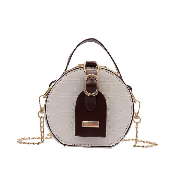 the new super crocodile-print mini bag is a retro premium small round bag with a colored mini
the new super crocodile-print mini bag is a retro premium small round bag with a colored mini