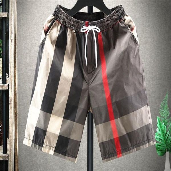 men's shorts oversized plaid sports casual beach pants streetwear fashion quick-drying pocket drawstring elastic waist 2021, White;black
men's shorts oversized plaid sports casual beach pants streetwear fashion quick-drying pocket drawstring elastic waist 2021, White;black