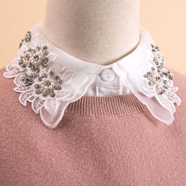 appliques fake collar ladies blouse white lace sleeveless women chiffon shirt 2021 winter fashion office lady fake half shirt
appliques fake collar ladies blouse white lace sleeveless women chiffon shirt 2021 winter fashion office lady fake half shirt