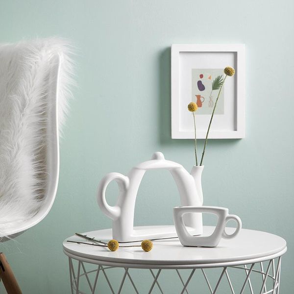 vases fashion modern style white ceramic deskflower wedding decoration vase 3 kinds of teapot home accessories
vases fashion modern style white ceramic deskflower wedding decoration vase 3 kinds of teapot home accessories