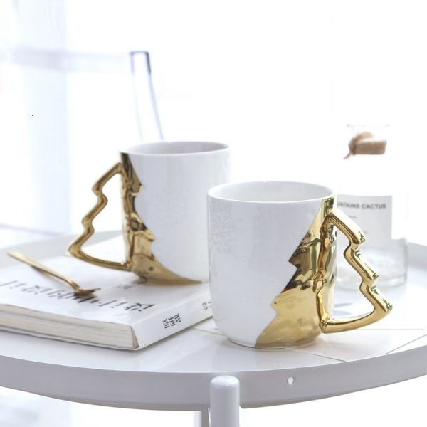 nordic light luxury fashion simple creative gold-plated christmas tree water cup snow texture white ceramic mug
nordic light luxury fashion simple creative gold-plated christmas tree water cup snow texture white ceramic mug