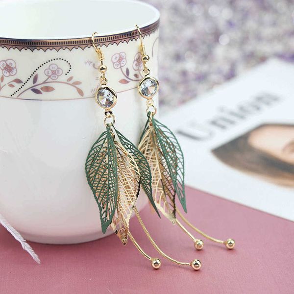 net red hollow sheet mode temperament personality long zircon show thin face fresh earrings, Golden
net red hollow sheet mode temperament personality long zircon show thin face fresh earrings, Golden