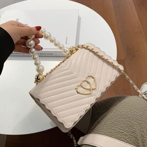 shoulder bags lady pearl sweet tote bag 2021 fashion pu leather women's designer handbag travel chain messenger
shoulder bags lady pearl sweet tote bag 2021 fashion pu leather women's designer handbag travel chain messenger