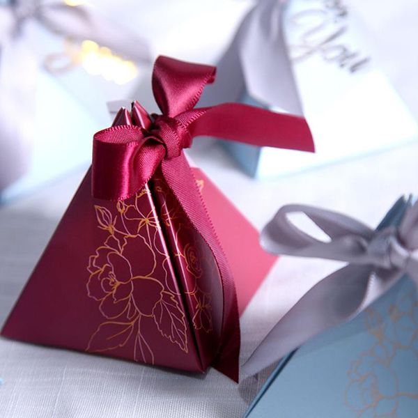creative triangular gifts boxes pyramid candy box wedding favors candy bags for guests wedding decoration baby shower gifts
creative triangular gifts boxes pyramid candy box wedding favors candy bags for guests wedding decoration baby shower gifts