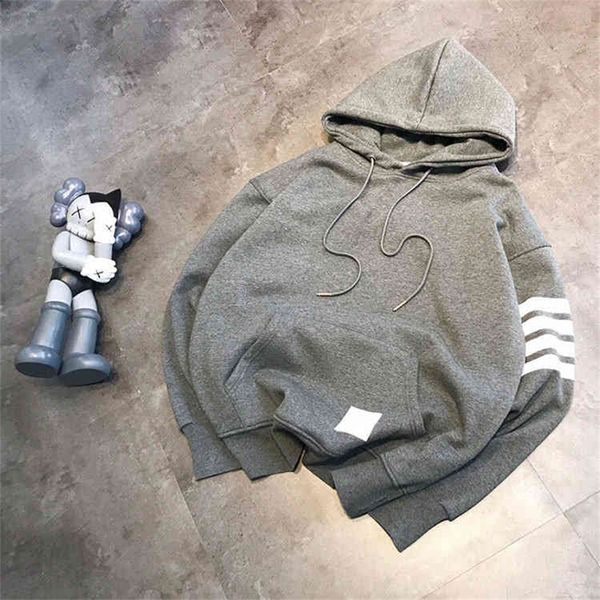 fashion yarn dyed four bar silver plush and hooded sweater for men women fashion couple leisure, Black
fashion yarn dyed four bar silver plush and hooded sweater for men women fashion couple leisure, Black