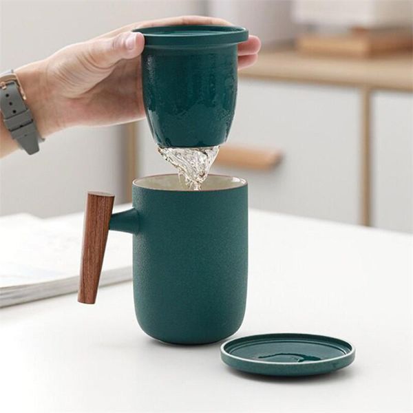 mugs ceramic wooden handle tea mug with filter and lid creative elegant teapot large capacity water separation cup office set
mugs ceramic wooden handle tea mug with filter and lid creative elegant teapot large capacity water separation cup office set