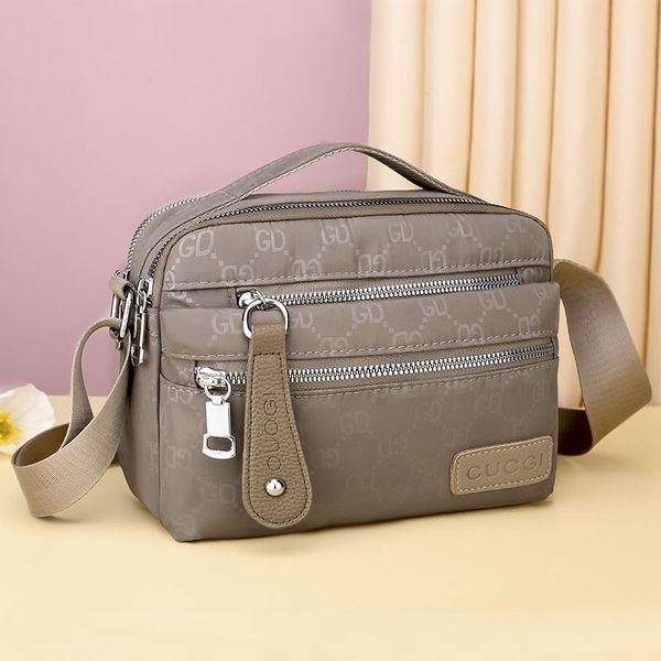 new women's multi-layer single shoulder messenger bag leisure nylon mother bag business collection canvas purse outlet
new women's multi-layer single shoulder messenger bag leisure nylon mother bag business collection canvas purse outlet