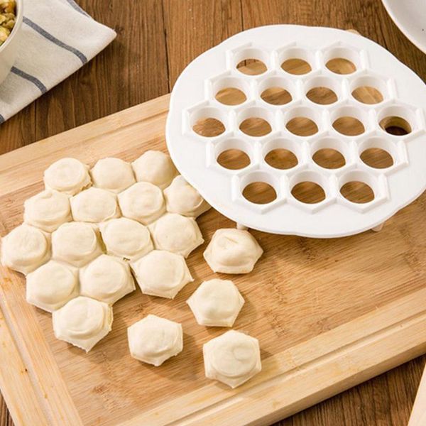 1pc diy dough press dumpling maker white plastic dumpling mold 19 holes dumplings maker mold tools kitchen pastry tools 21x 2cm
1pc diy dough press dumpling maker white plastic dumpling mold 19 holes dumplings maker mold tools kitchen pastry tools 21x 2cm