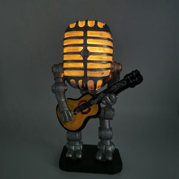 table lamps retro style microphone robot lamp holding guitare vintage resin decoration home
table lamps retro style microphone robot lamp holding guitare vintage resin decoration home