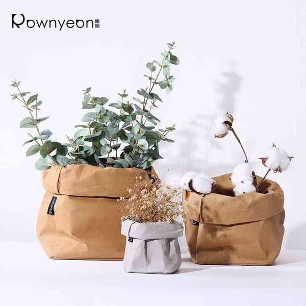 wind creative makeup table storage bag flower arrangement decoration bucket makeup kit kraft paper flowerpot
wind creative makeup table storage bag flower arrangement decoration bucket makeup kit kraft paper flowerpot