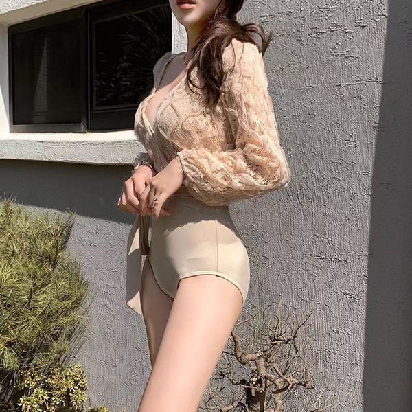 2021female designer new one body swimsuit female long sleeve slim body looks sexy, conceals belly, beach spring vacation bikini
2021female designer new one body swimsuit female long sleeve slim body looks sexy, conceals belly, beach spring vacation bikini